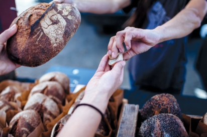 Fresh bread in exchange for incentive tokens at the farmers' market