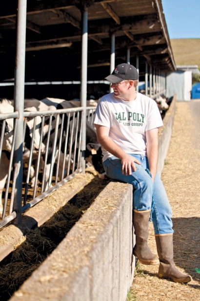 Brian Waymire, Robert Giacomini Dairy herdsman, checks on his herd