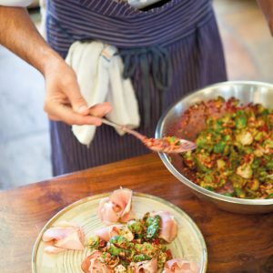 Chef Trevor Kunk making Brussels Sprouts, Blood Orange & Ham recipe