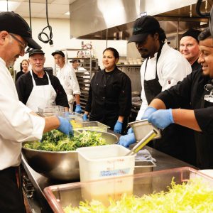 Fresh Starts graduates prepare for a chef event